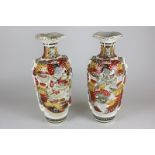 A pair of Japanese satsuma vases depicting warriors (a/f), 32cm high