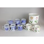 Six modern Spode blue and white mugs in 19th century designs, a Tiffany plant pot and two mugs in