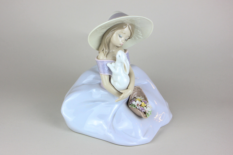 A Lladro porcelain figure,Bunny Kisses, the 2001 event figurine (ref 6741), 19cm high, with box