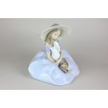 A Lladro porcelain figure,Bunny Kisses, the 2001 event figurine (ref 6741), 19cm high, with box