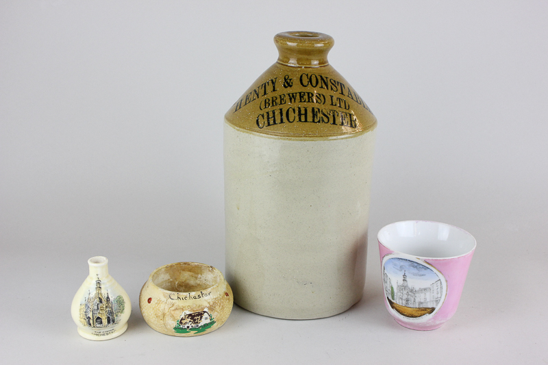 A Henty & Constable Brewers Ltd Chichester stoneware flask, a teacup depicting the Market Cross