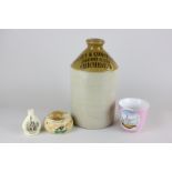 A Henty & Constable Brewers Ltd Chichester stoneware flask, a teacup depicting the Market Cross