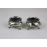 A pair of Victorian silver salts with gadroon borders,lion mask and paw feet, maker Thomas Hayes,
