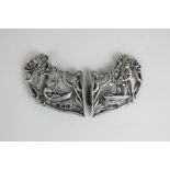 An Edwardian silver belt buckle, maker Samuel Jacobs, London 1902, depicting a man and a woman