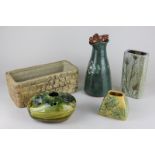 A Cobb pottery pebble vase, a Harmony Cornish pottery vase, a Hillstone pottery planter, together