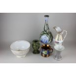 An English pottery bottle neck pottery vase, two bud vases, a lustre ware cup, a gilt decorated