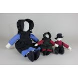 Three Amish cloth dolls, two women and a man