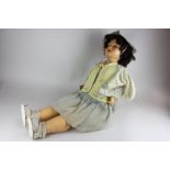 A large composite doll with sleeping eyes and open mouth, 74cm, (a/f)