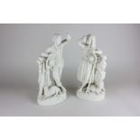 A pair of Parian figures of a shepherd and goatherd, the boy and girl both raising a flower and