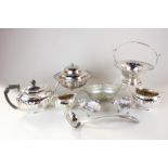 A silver plated muffin dish, a three piece silver plated tea set, a cake basket, a bonbon dish and a