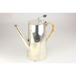 An Asprey silver plated coffee pot with wicker wrapped handle and bean finial