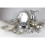 A large collection of silver plated items including entree dish marked Harrods, a large jug, a