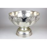 A large silver plated punch bowl with overlaid grapevine decoration, 40cm diameter