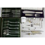 A pair of Italian 800 silver handled carvers, a cased set of Walker and Hall fish servers, a