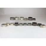 Sixteen various silver napkin rings including five pairs, two marked 800, 9.5oz gross