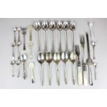 A set of six Victorian silver teaspoons with twist handles, seven English and Continental silver