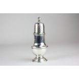 A George II silver spice caster, baluster shape with pierced lid and finial, maker Samuel Wood,