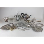 A three piece silver plated tea set, a hot chocolate pot, a watering can, three oval dishes, two