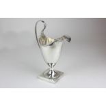 A George III silver cream jug, helmet shape with gadroon border, by Hester Bateman, London 1789,