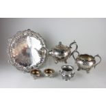 A Victorian silver plated teapot and sugar bowl, circular form with engraved decoration; a plated