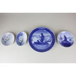 A Royal Copenhagen porcelain Christmas plate, 1978, three small pates, one depicting the mermaid and