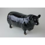 A Beswick porcelain Aberdeen Angus bull marked approved by the Aberdeen Angus Cattle Society, in