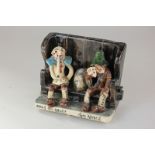 A Will Young Widecombe pottery figure group of Uncle Tom Cobbley and Tom Pearse with a sack of