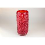 A rare Whitefriars glass textured bark vase with fluted base in ruby red colour way, pattern 9734,