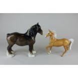 A Beswick palomino prancing Arab type (1262), and a Beswick shire mare (818) in brown gloss