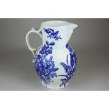 A 19th century Royal Worcester blue and white porcelain mask jug decorated with mixed flowers,