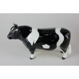 A Beswick porcelain Friesian bull, Champion Coddington Hilt Bar, model 1439A, in black and white