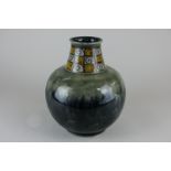 A Royal Doulton stoneware pottery vase, the globular body with narrow neck and scroll design, 20cm