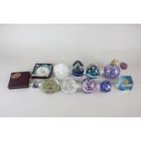 Two Caithness paperweights, watercolour and moon crystal, together with a collection of other