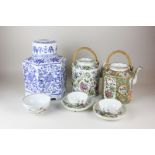 Chinese porcelain, a famille rose teapot, another decorated in bright colours, blue hexagonal ginger