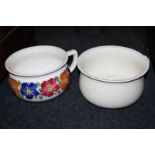 A Hungarian pottery chamber pot with floral design, together with a plain cream chamber pot