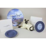 A Royal Doulton porcelain model of a Siamese cat, 18cm, a Wedgwood Concorde commemorative dish and