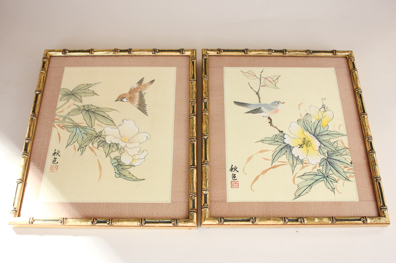A pair of Chinese silk paintings of birds and flowers, signed and stamped with character marks, 19cm