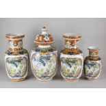 A pair of Chinese baluster vases, a matching ginger jar and cover and a smaller vase, tallest 35cm
