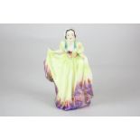 A porcelain figure of a woman titled Verona, possibly Royal Doulton trial piece, marked BGH made