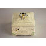 A Crown Devon pottery square honeycomb box and cover with overlaid bee decoration (a/f - wing