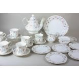 A Paragon china tea set of teapot, sugar bowl, cream jug, six cups and saucers, side plates and