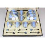 An Art Deco Royal Doulton porcelain coffee service for six, in fitted case, with blue and gilt