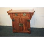 A 20th century Chinese hardwood altar table, the rectangular top with raised edges over scrolled