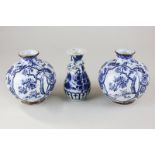 A pair of German vases in the style of Japanese blue and white globular vases, marked Royal Bonn,