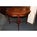 An Edwardian inlaid mahogany octagonal table on square tapered legs with uniting stretcher, 91cm