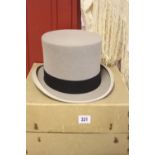 Millinery: Moss Bros grey top hat with black band. Size 7½.