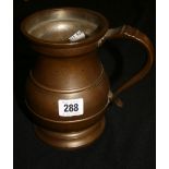 19th cent. Bronze baluster quart tankard with tinned interior.