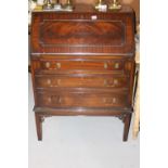 20th cent. Mahogany drop front bureau with chamfered supports.