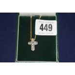 Jewellery: Yellow metal marked 14ct. chain with suspended cross, import marks, cross set with