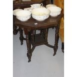 Edwardian mahogany octagonal occasional table with galleried second tier.